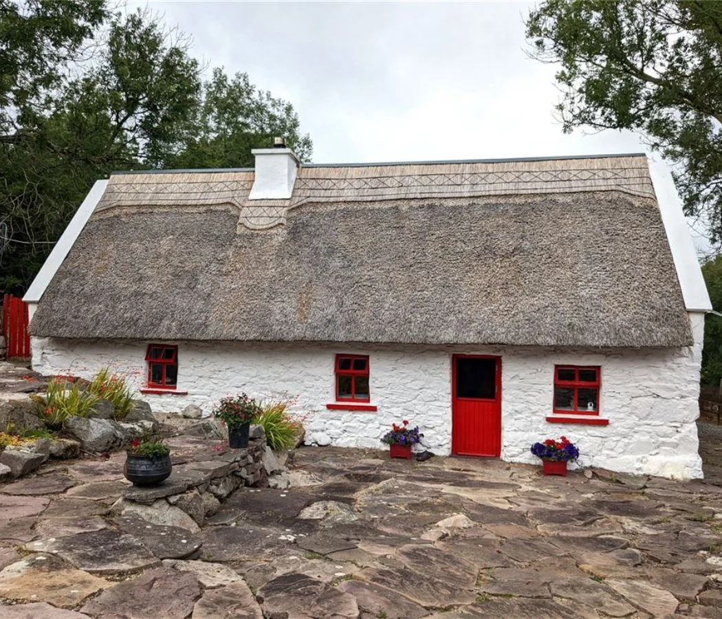 This lovingly restored traditional thatched cottage in Westport is on the market for €215,000
