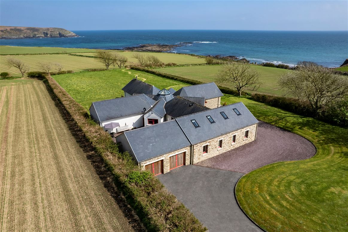 This Kinsale home with floor-to-ceiling windows and sea views is on the market for €1.25 million