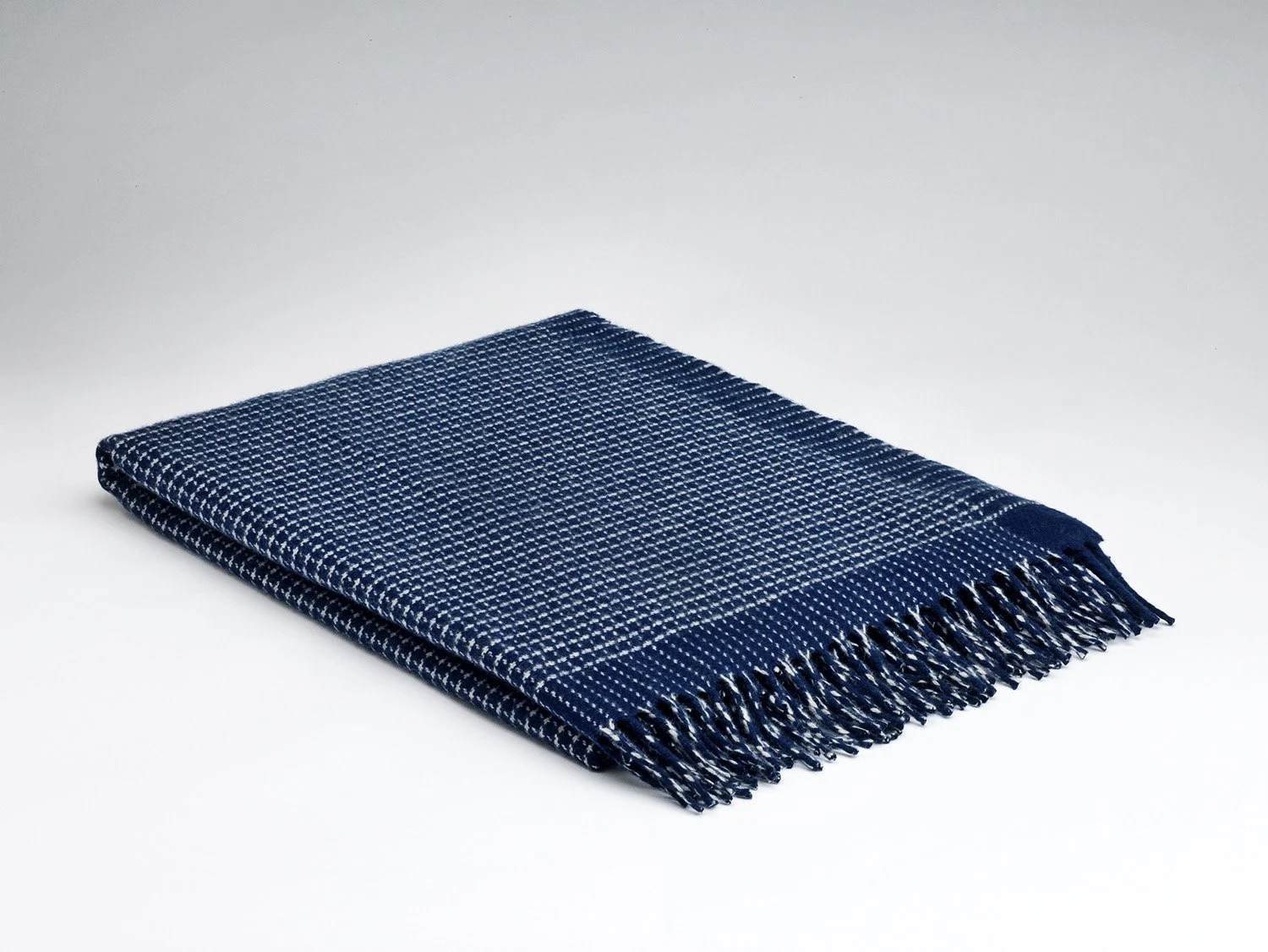 Alpine Navy throw, €160, McNutt of Donegal