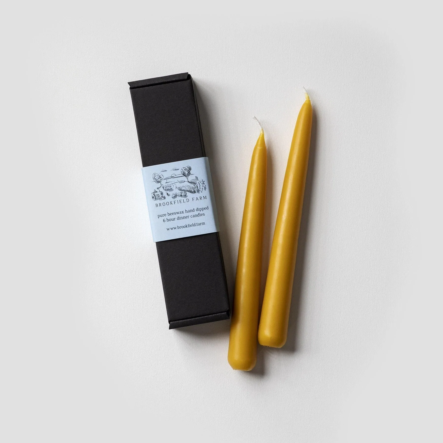 Pair of hand dipped dinner candles, €14, Brookfield Farm