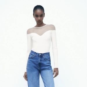 Contrast Tulle Bodysuit, €19.95, Zara