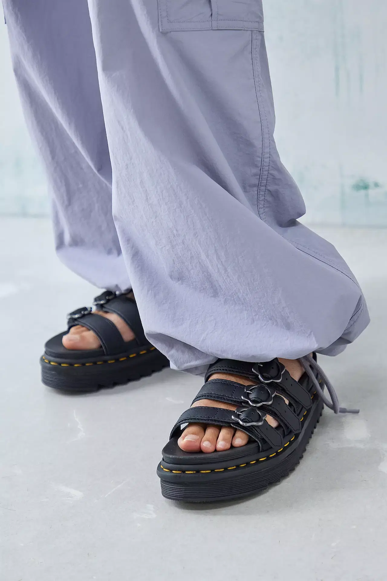 Urban Outfitters, Dr. Martens Blaire Black Flower Slider Sandals, €125