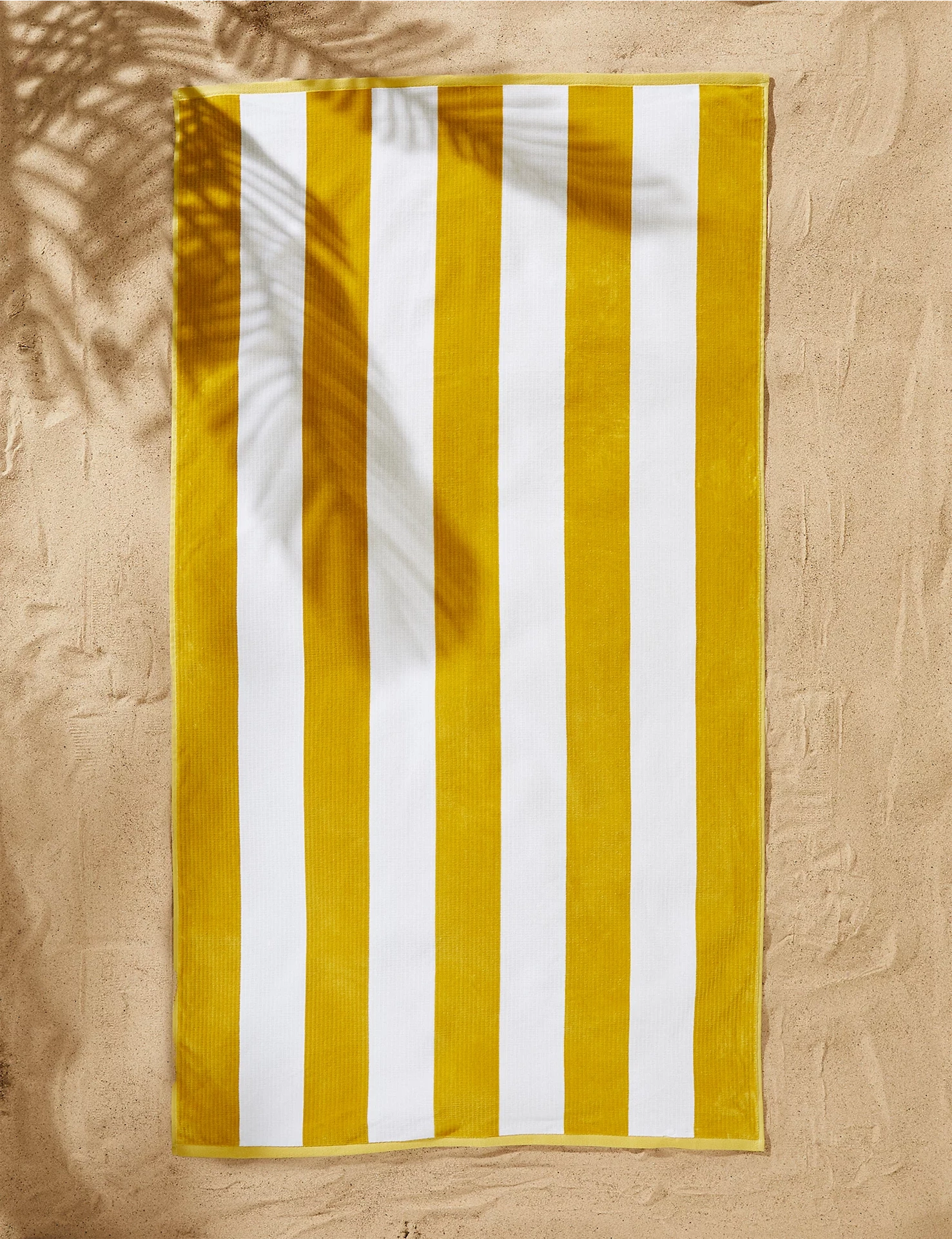 Marks & Spencer Pure Cotton Sand Resistant Striped Beach Towel, €24