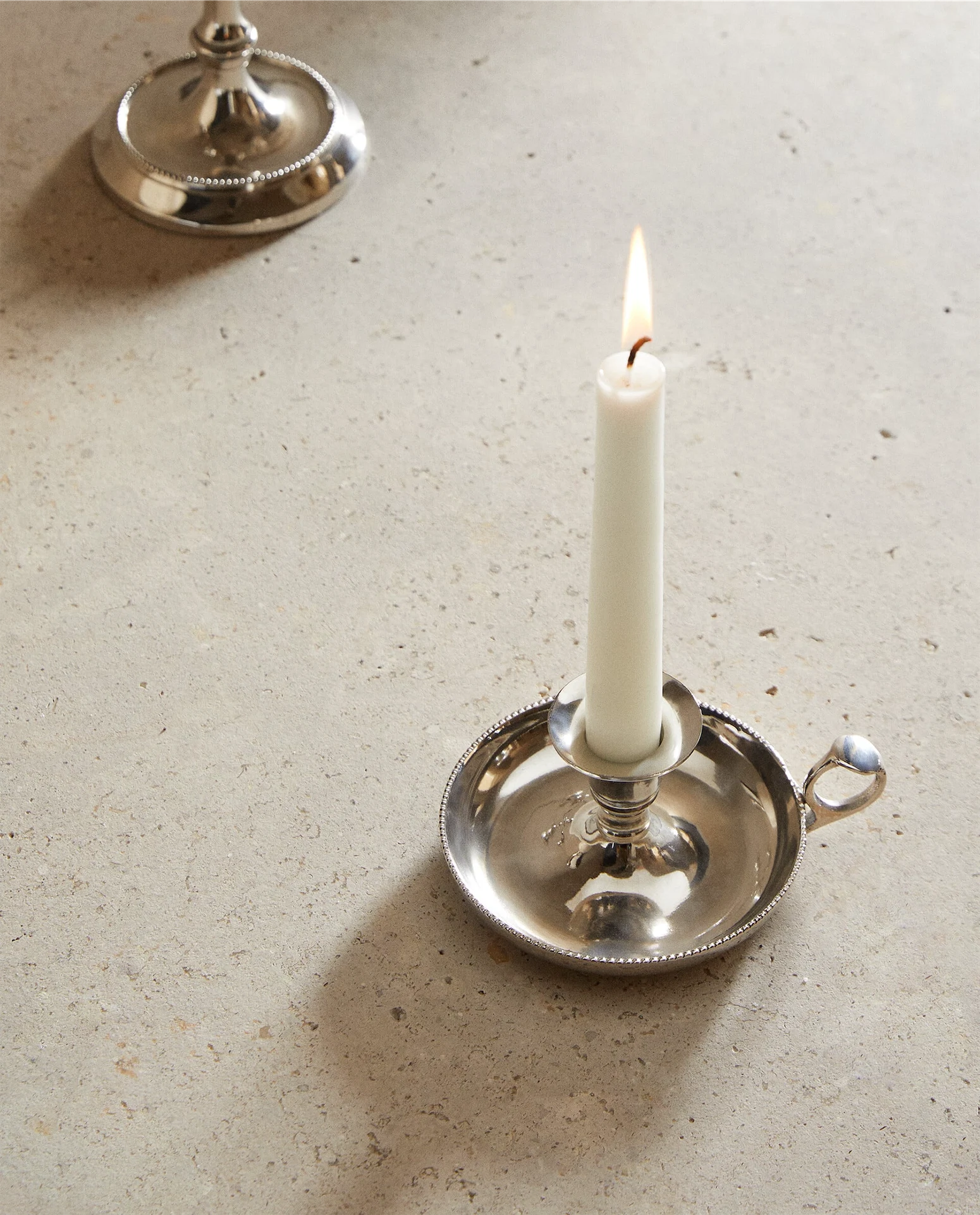 Zara, Shiny Aluminium Candle Holder, €7.99