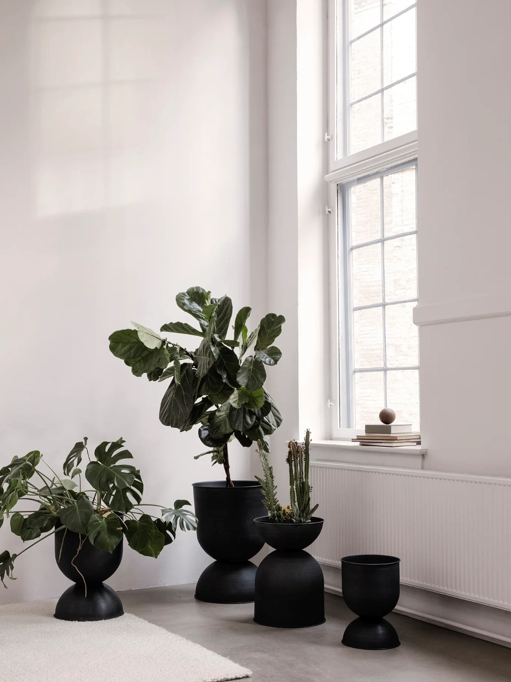 Hourglass plant pot, from €135, Industry & Co