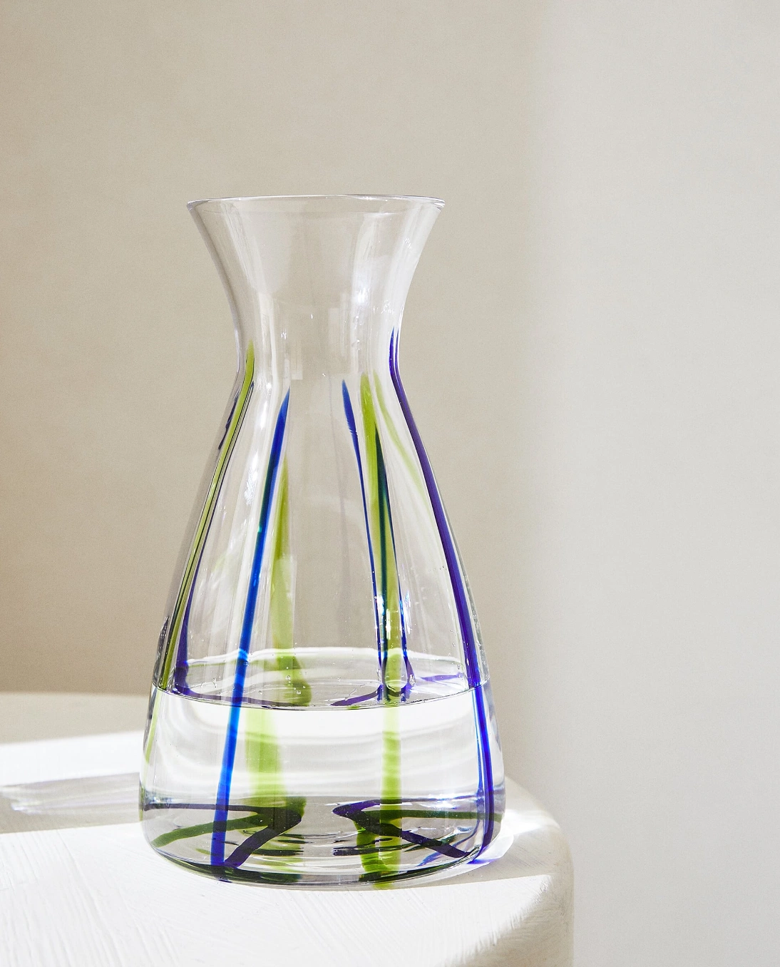 Glass bottle with coloured lines, €17.99, Zara Home 