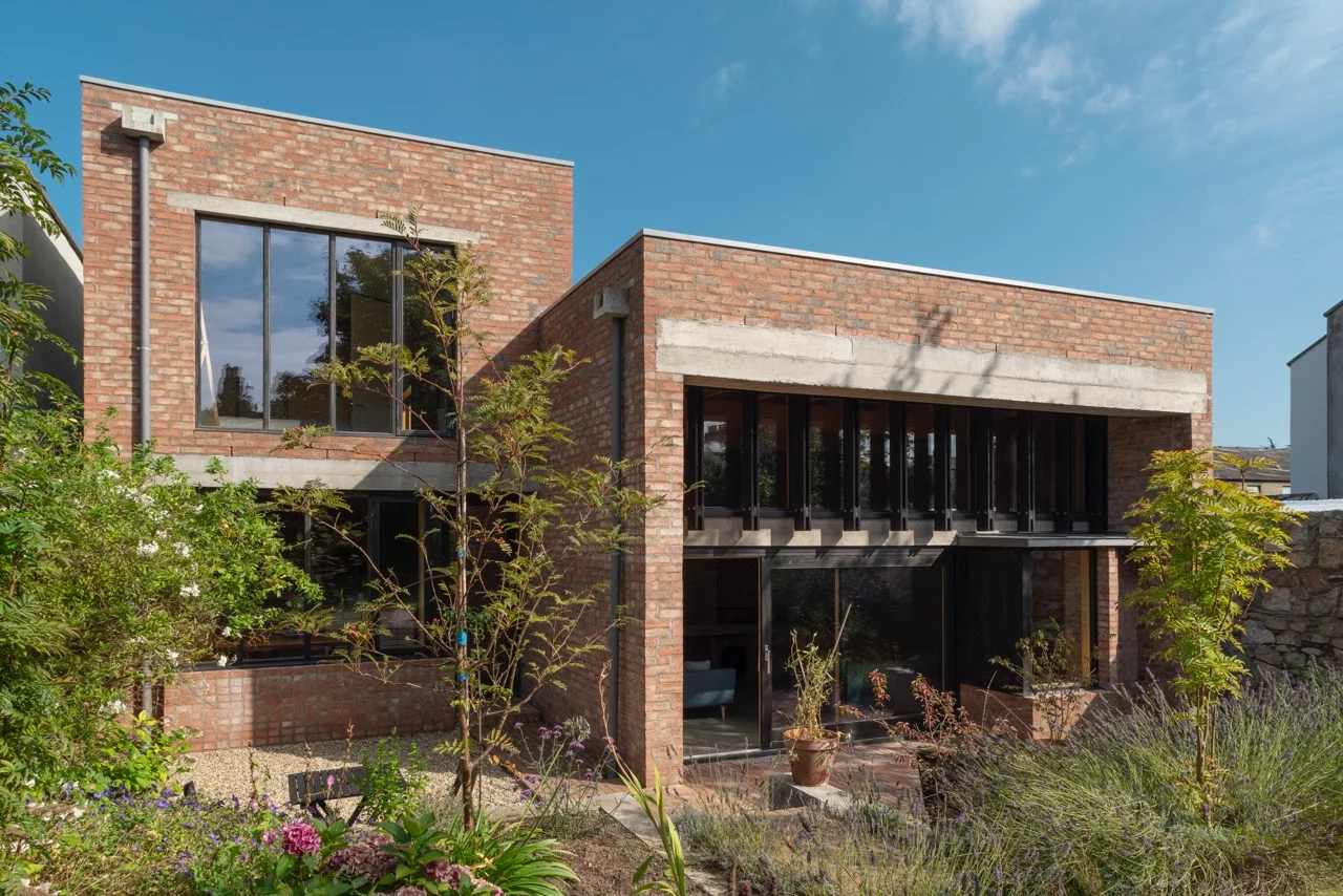 Two architects have created a spacious family home on an awkward mews site