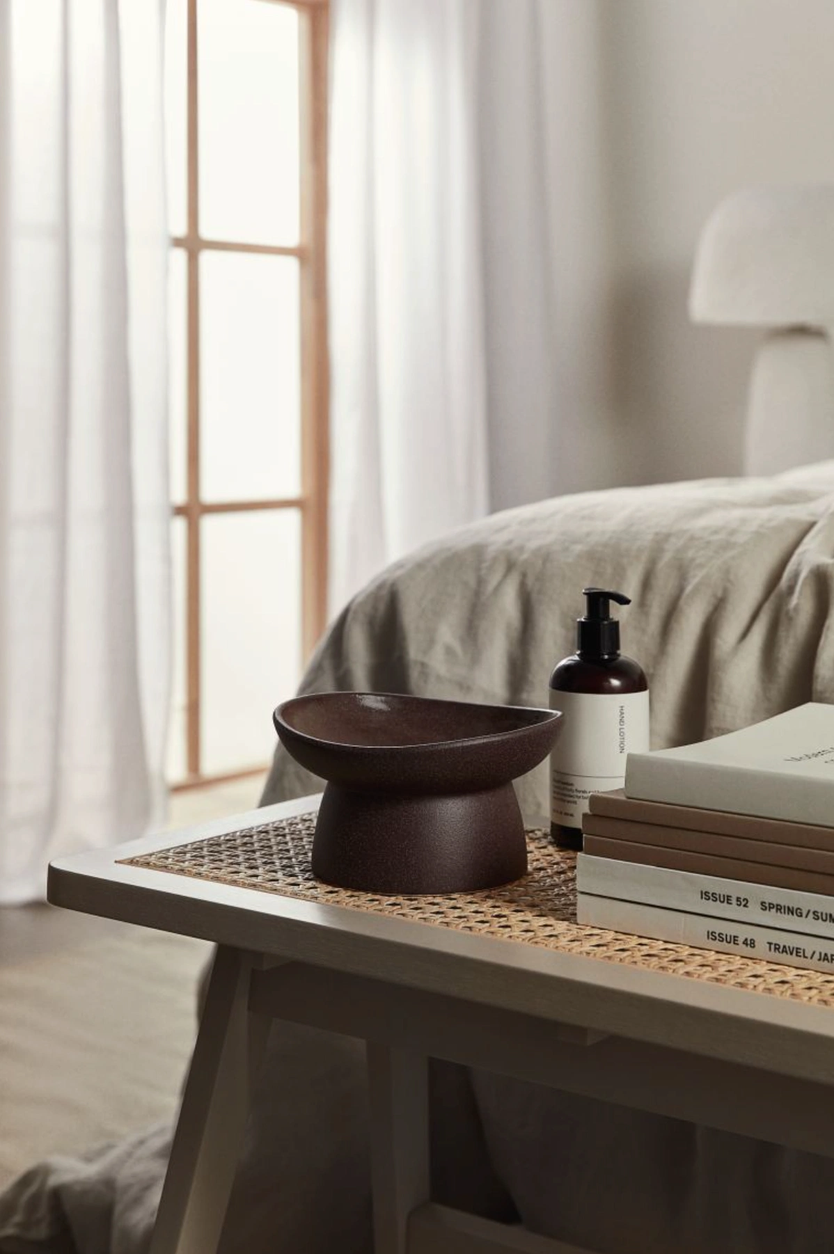 Scented candle in stoneware holder, €19.99