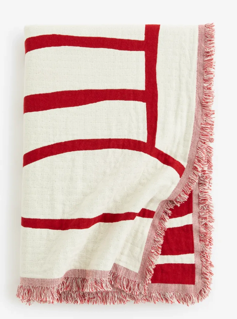 Jacquard-weave cotton blanket, €59.99