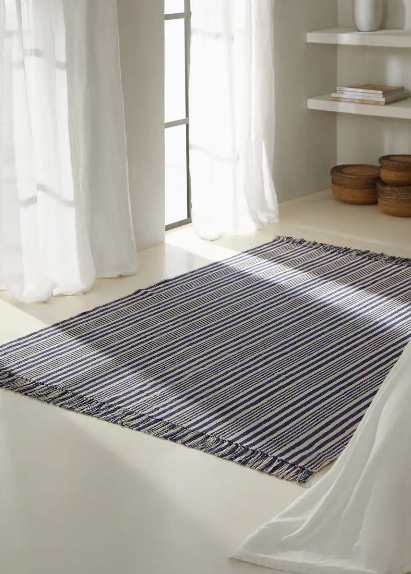 Striped carpet, €45.99, Mango