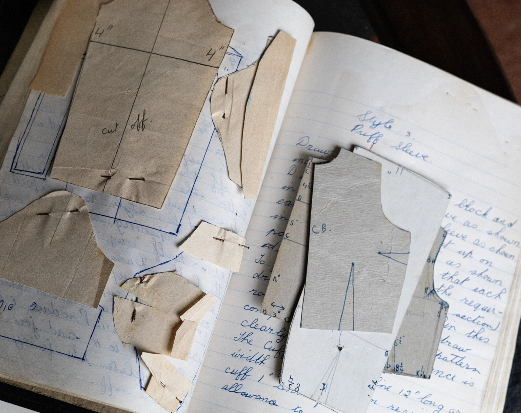 Ruth O’Connor explores her mother's old fashion journals. Photo: Marlene Wessels