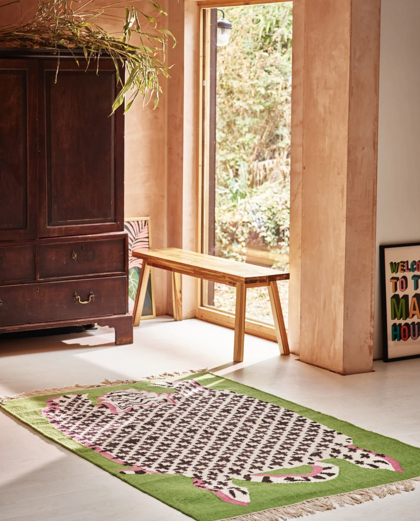 Luca Leopard Handwoven Green Wool & Cotton Rug, €330, Oliver Bonas