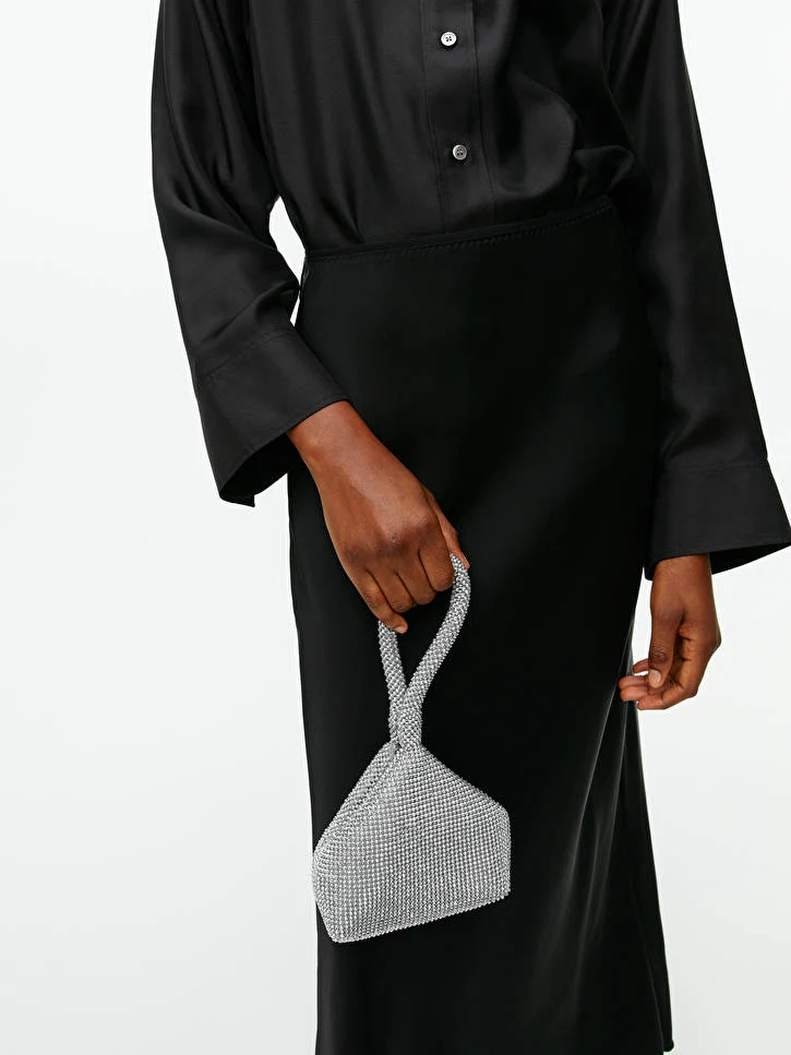 ARKET Metallic Pouch, €79