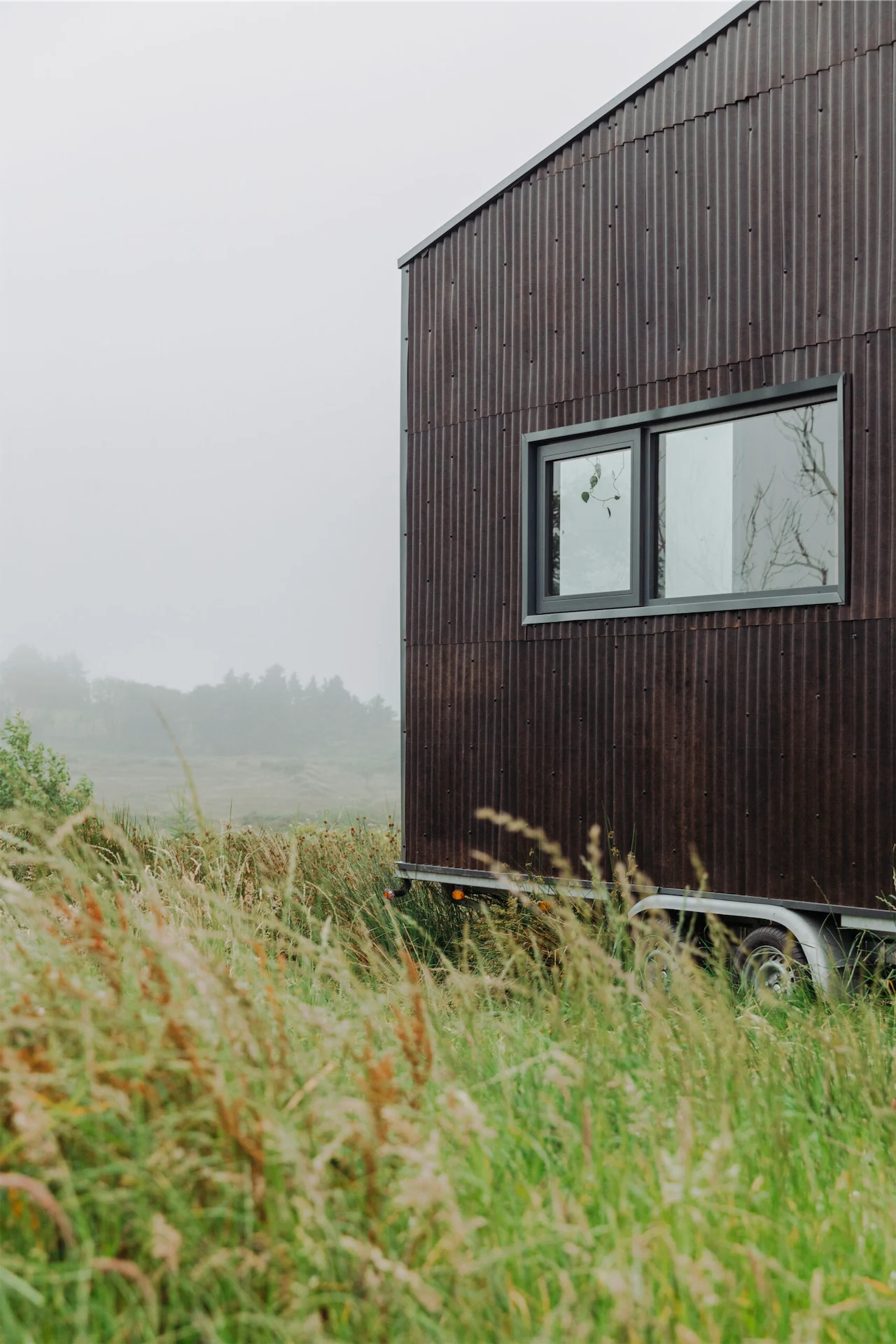 Tigíns are built on trailers specially made in the Netherlands. Wheels allow for the tiny houses to be less permanent (and not require planning permission).