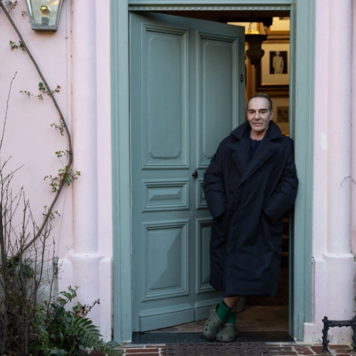 John outside his home in Northern France