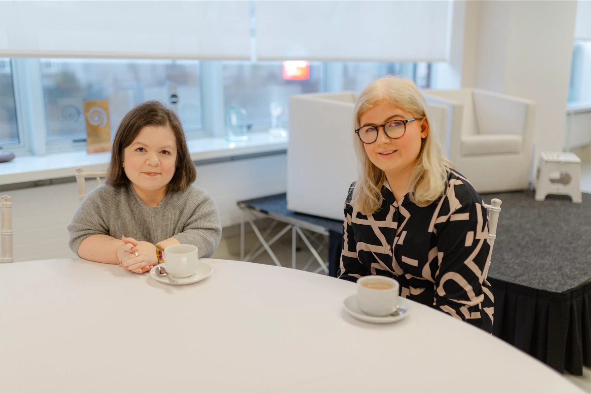 Sinéad Burke, left, and Niamh Donnelly, right, sit beside each other at a recent Eversheds Sutherland event.