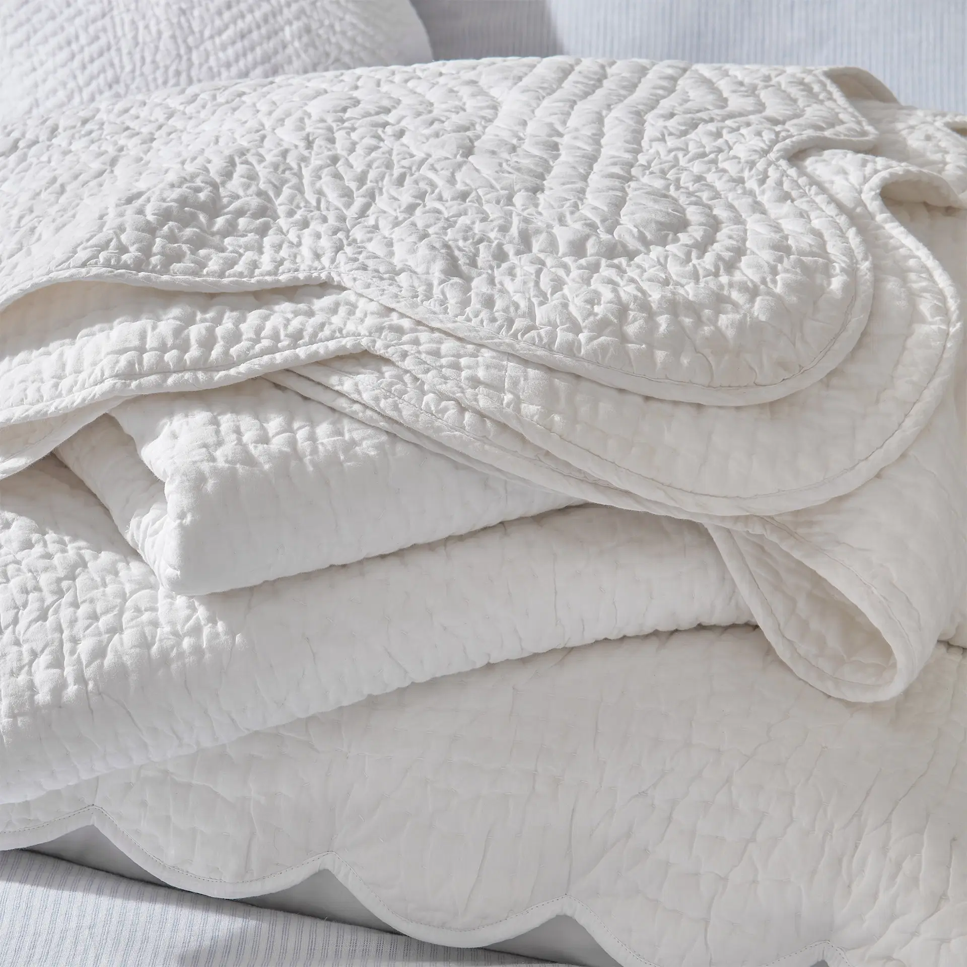Milfield Scallop Edge Quilt, €247-€351