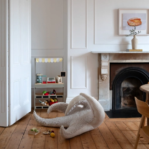 The kitchen and dining space doubles as a playroom. 