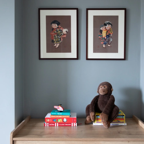 The pictures in Teddy’s room belonged to Indy’s great-grandmother, who was Japanese.