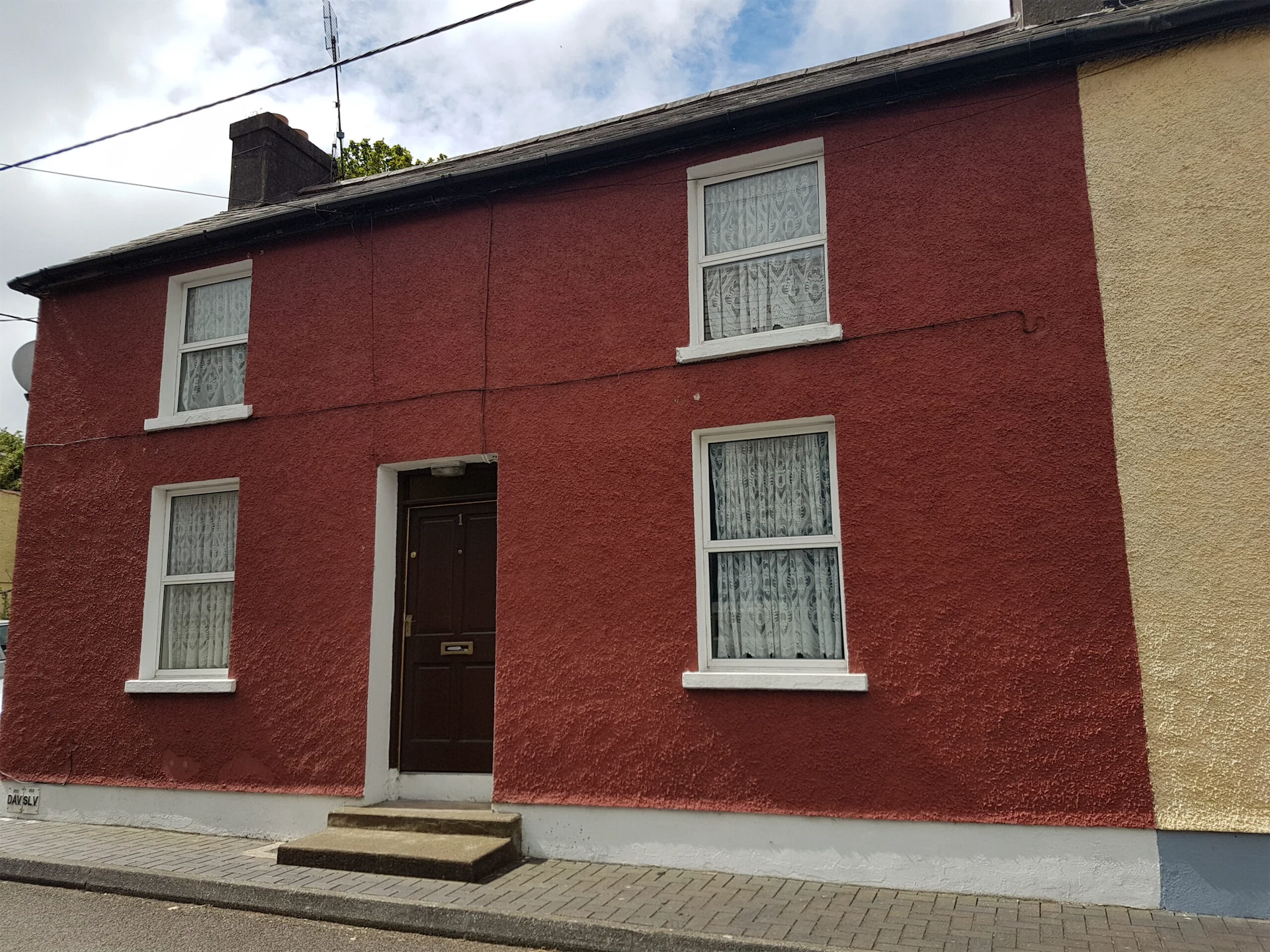 Before: The exterior of the house