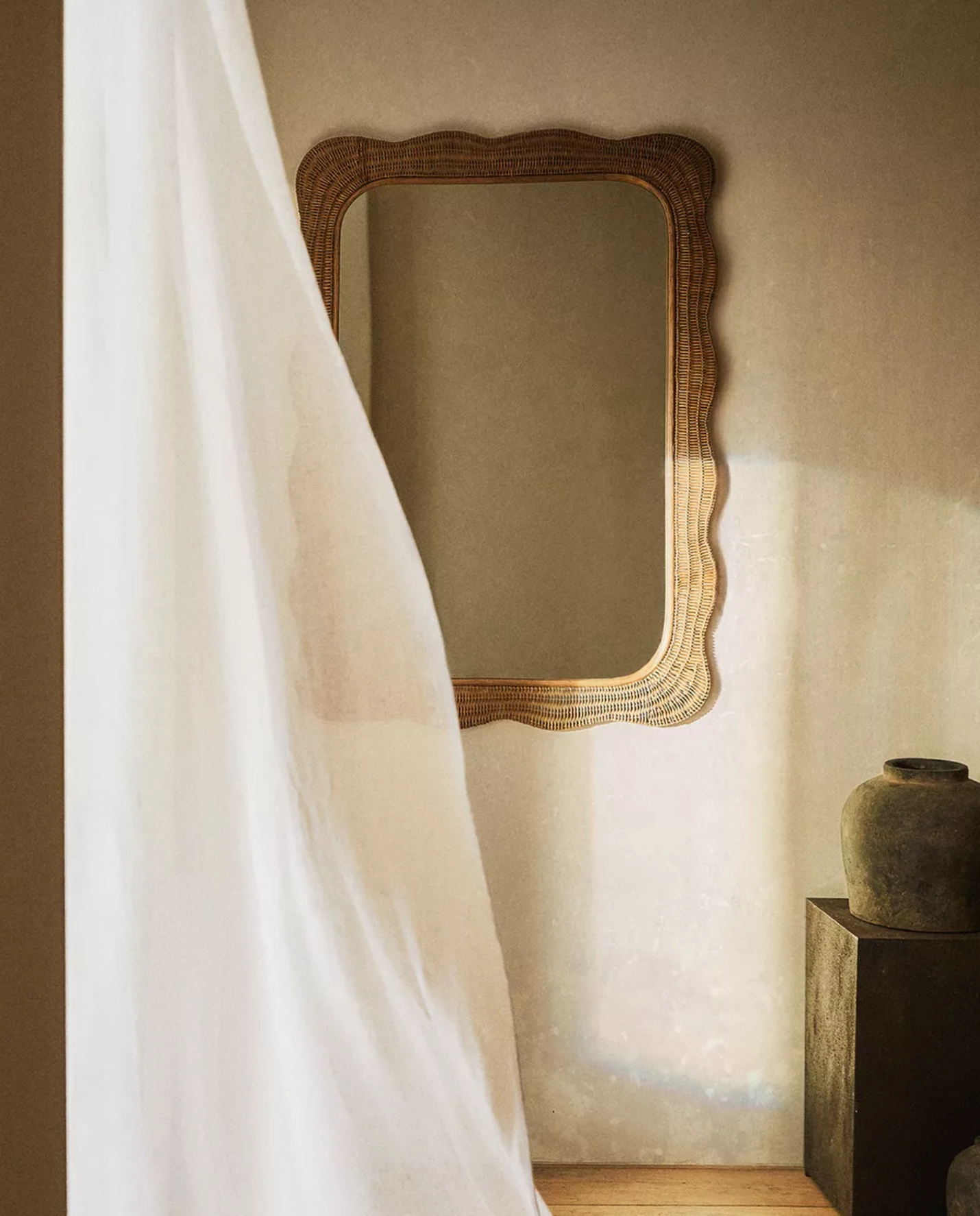 Rattan wall mirror, €189, Zara Home