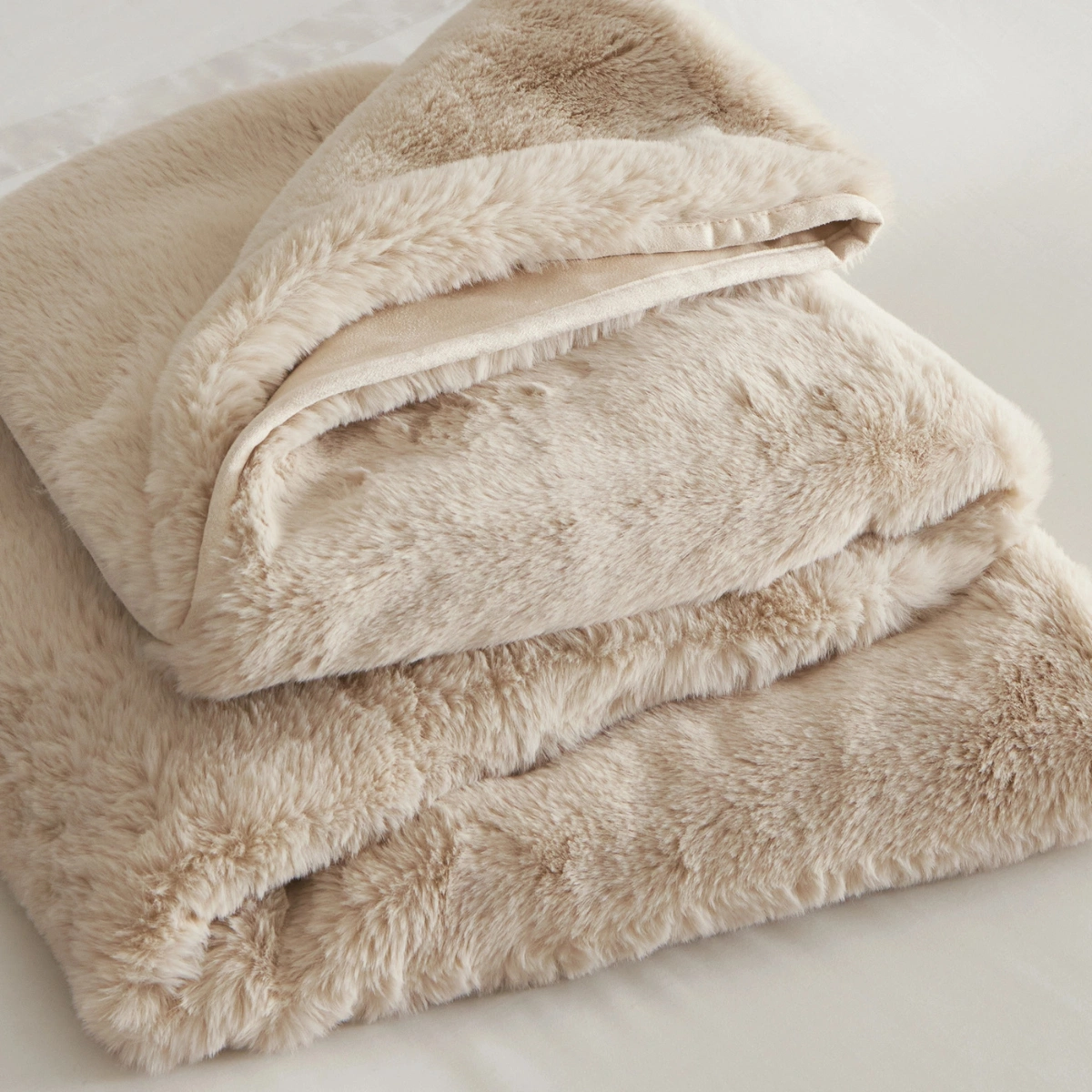 The White Company Super Soft Faux Fur Heated Blanket, €195