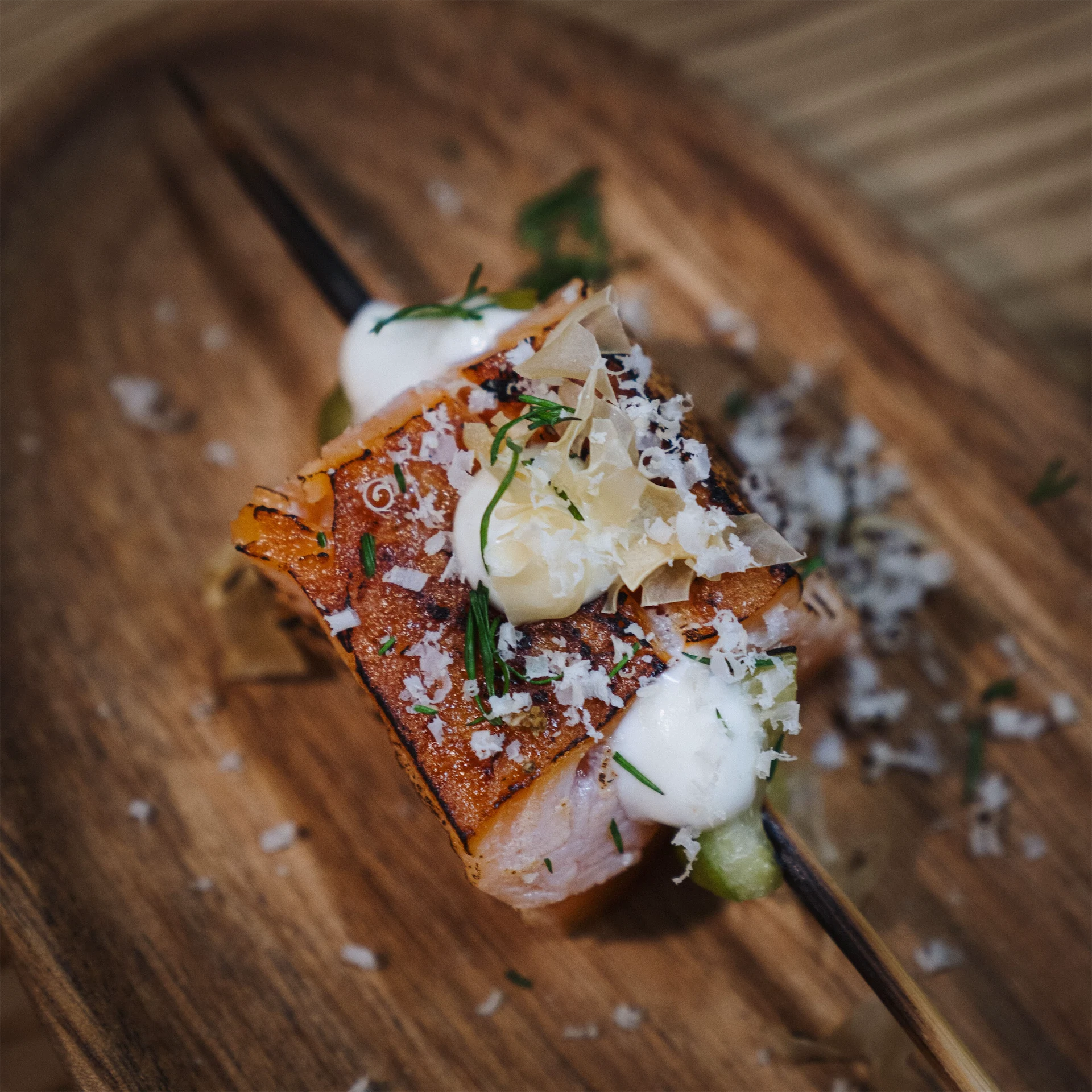 Smoked salmon with shaved hazelnut, lemon aioli, pickled cucumber and Irish seaweed. Image by James Gabriel Martin