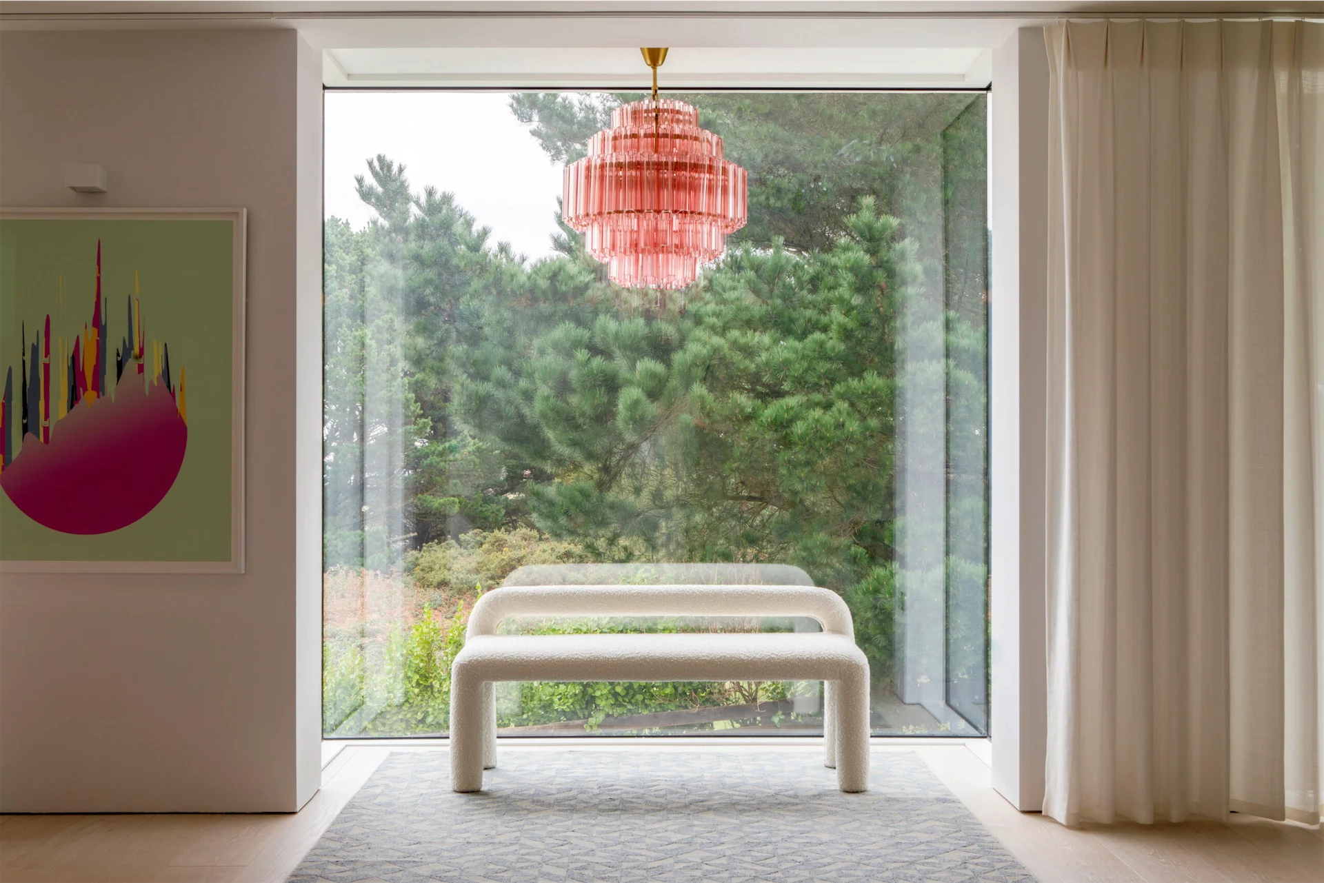 A bench brought from Vogue’s previous home sits below a light from Pure White Lines. 