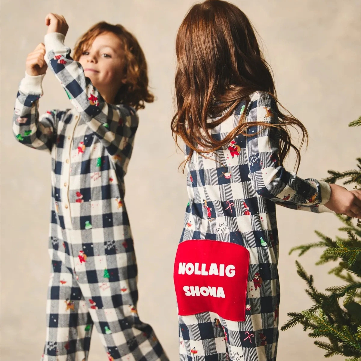 Leigh Tucker Willow Gingham Bells Onesie, €15