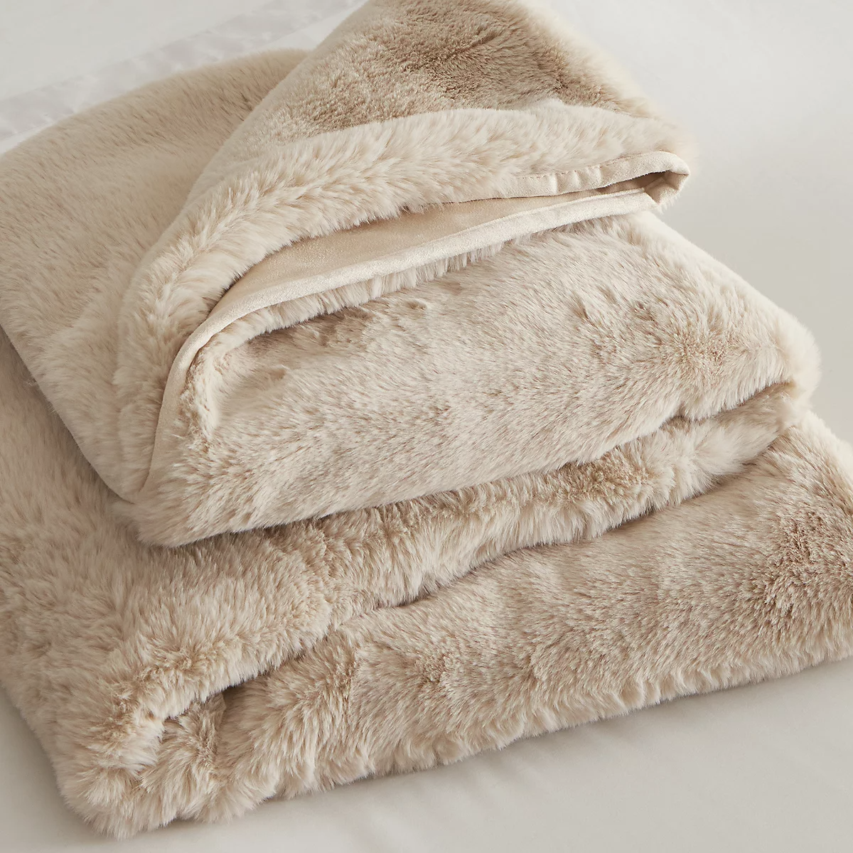 The White Company Super Soft Faux Fur Heated Blanket, €195