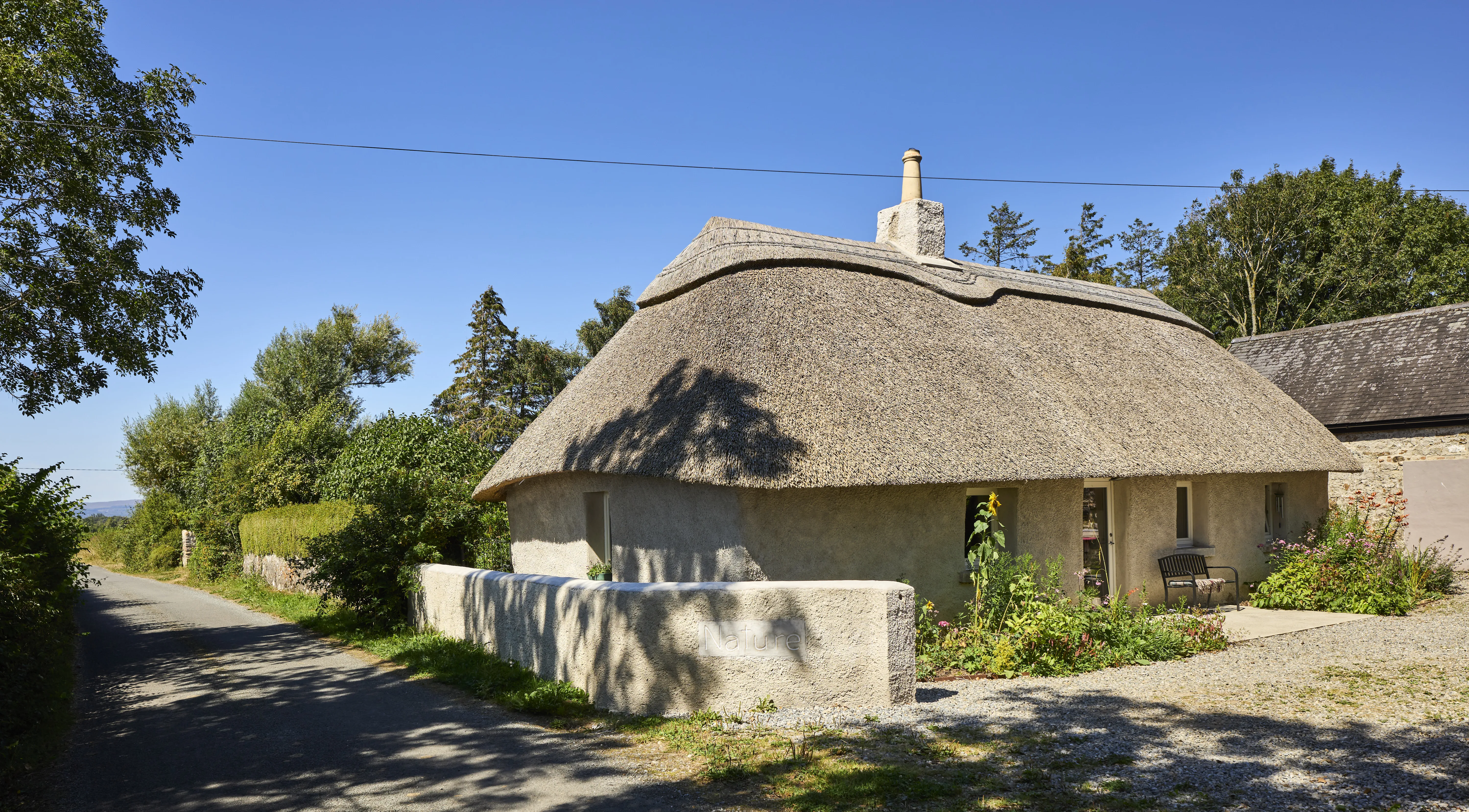An architect has gently restored her thatched Tipperary cottage to improve flow
