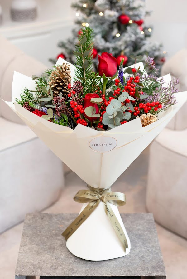 bouquet of colourful flowers wrapped with a bow 